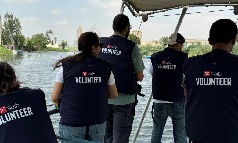 بالصور.. بنك saib ينظم يوماً تطوعياً لتنظيف مياه النيل بجزيرة القرصاية بالجيزة