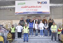 بالصور.. بنك التنمية الصناعية يشارك في حملة «ستر ودفا» لتدفئة الأسر الأولى بالرعاية