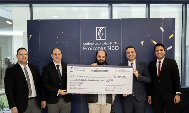 بنك الإمارات دبي الوطني يسلم الفائز في حملة «مستندات التحصيل» 30 ألف جنيه «فيديو»